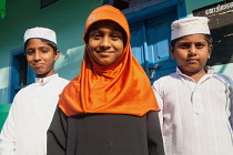 India, Kerala, Alleppey, Portrait of muslim brothers and sister in Alleppey.