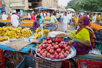 India, Karnataka, Bijapur, Fruit vendor in Bijapur market.