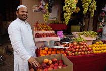 India, Maharashtra, Dhule, Fruit vendor in the market at Dhule.