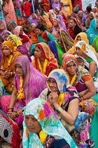 India, Madhya Pradesh, Omkareshwar, A group of female pilgrims at a prayer gathering in Omkareshwar.