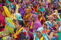 India, Madhya Pradesh, Omkareshwar, A group of female pilgrims at a prayer gathering in Omkareshwar.