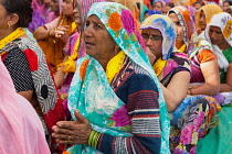 India, Madhya Pradesh, Omkareshwar, A group of female pilgrims at a prayer gathering in Omkareshwar.