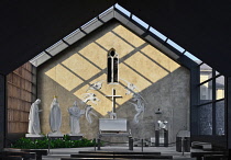 Ireland, County Mayo, Knock Shrine, Apparition Chapel, Altar with white marble statues on the wall where the apparition of the Blessed Virgin took place on August 21st 1879.