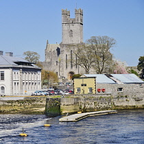 Ireland, County Limerick, Limerick City, St Marys Church of Ireland Cathedral also known as Limerick Cathedral with the River Shannon in the foreground..