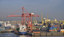 Ireland, County Dublin, Dublin Ferryport, cranes and freight containers seen from departing ferry vessel.