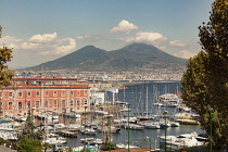 Italy, Campania, Naples, Lega Navale Italiana building and Mount Vesuvius.