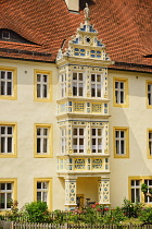 Germany, Bavaria, Rothenburg ob der Tauber, Facade of a building near Jakobskirche or St James Church.