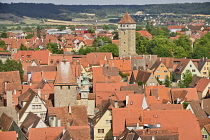 Germany, Bavaria, Rothenburg ob der Tauber, Marks Tower and Roeder Arch from Town Hall Tower with Roeder Gate in the background.