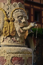 Germany, Bavaria, Rothenburg ob der Tauber, Fountain detail on Herrngasse.