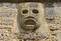Germany, Bavaria, Rothenburg ob der Tauber, Burgtor or Castle Gate, Detail featuring the Hot Pitch Mask for pouring hot oil, tar and other boiling liquids on uninvited guests.