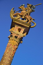 Germany, Bavaria, Rothenburg ob der Tauber, Marktplatz, St Georges Fountain with figure on horseback on a pedestal.