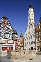 Germany, Bavaria, Rothenburg ob der Tauber, Marktplatz, Rathaus Tower and St Georges Fountain.--