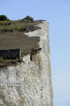 England, East Sussex, Birling Gap, Cliff face showing erosion and cracks.