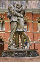 England, London, St Pancras railway station on Euston Road, The Meeting Place statue by Paul Day.