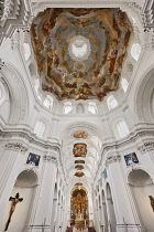 Germany, Bavaria, Wurzburg, Neumunster Church, General view of the interior with ceiling frescoes.