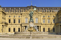 Germany, Bavaria, Wurzburg, Wurzburg Residenz or Residence Palace facade with the Franconia Fountain.