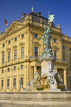 Germany, Bavaria, Wurzburg, Wurzburg Residenz or Residence Palace facade with the Franconia Fountain.