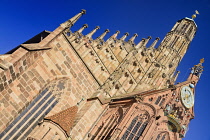 Germany, Bavaria, Nuremberg, Marktplatz, Facade of the 14th century Frauenkirche or Church of Our Lady, also visible is the  Männleinlaufen a mechanical clock that commemorates the Golden Bull of 135...