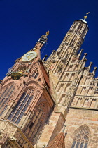 Germany, Bavaria, Nuremberg, Marktplatz, Facade of the 14th century Frauenkirche or Church of Our Lady, also visible is the  Männleinlaufen a mechanical clock that commemorates the Golden Bull of 135...