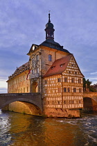 Germany, Bavaria, Bamberg, Altes Rathaus or Old Town Hall, Floodlit at dusk.