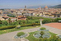 Italy, Tuscany, Florence, River Arno with Ponte Vecchio and the dome of the Cathedral seen from Piazzale Michelangelo.