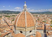 Italy, Tuscany, Florence, Duomo or Cathedral also known as Santa Maria del Fiorel, View of the dome from the cathedral's bell tower.