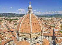 Italy, Tuscany, Florence, Duomo or Cathedral also known as Santa Maria del Fiorel, View of the dome from the cathedral's bell tower.