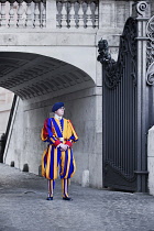 Italy, Vatican City, St Peters Square with  Swiss Guard on duty.