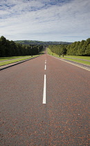 Ireland, North, Belfast, Stormont assembly buildings entrance road stretching into the distance.