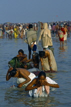 India, West Bengal, Sagar Island, Pilgrims at the three day Sagar bathing festival which takes place at island at the mouth of the Hooghly at the point where the Ganges joins the sea.
