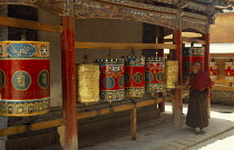 Tibet, Religion, Monks and prayer wheels.