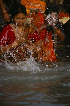 India, Uttar Pradesh, Varanasi, Women bathers in the River Ganges.