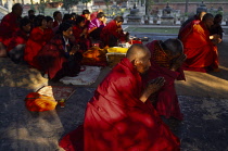 India , Bihar , Bodh Gaya, Bhutanese Buddhist pilgrims praying.