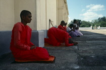 Sri Lanka, Religion , Buddhism, Praying at a temple.