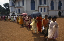 India, Kerala, Religion, Christian women and children leaving sunday church service.
