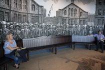 Ireland, North, Belfast, Titanic quarter visitor attraction, replica wooden bench.