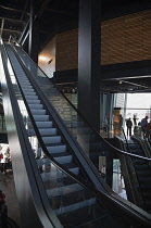 Ireland, North, Belfast, Titanic quarter visitor attraction interior with escalators.