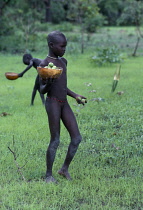 Sudan, General, Dinka children collecting shea butter fruit.