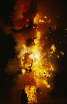 India, New Delhi, Dussehra Festival huge burning effigy and fireworks.