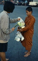 Thailand, General, Young monk collecting alms.