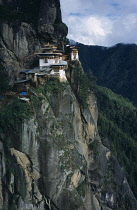 Bhutan, Religion, Buddhism, Taktshang Monastery or Tigers Lair, View towards exterior situated on steep cliff face.