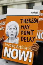 England, London, Westminster, Brexit demonstrations, Theresa May Article 50 placard.