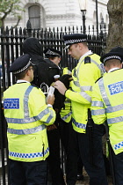 England, London, Westminster, Brexit demonstrations, police searching protestors back pack.