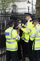 England, London, Westminster, Brexit demonstrations, police searching protestors back pack.