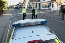 England, Kent, Police road traffic collision team cordoned off road.