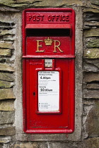 England, Cumbria, Far Sawrey, Post box mounted in wall.