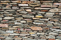 England, Cumbria, Keswick, Slate wall of building.