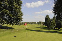 Sport, Ball, Golf, View down over 11th Green to the fairway of a golf course.