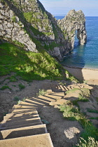 England, Dorset, Durdle Door, Steps leading down to the beach and the arch.