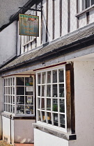 England, Somerset, Dunster, Shop named The Crooked Widow after architectural feature.